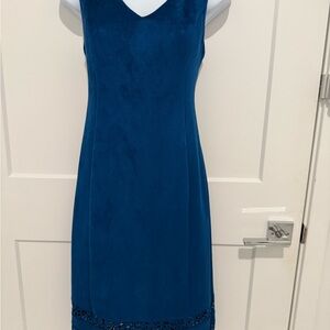 Blue faux suede dress with cut out bottom